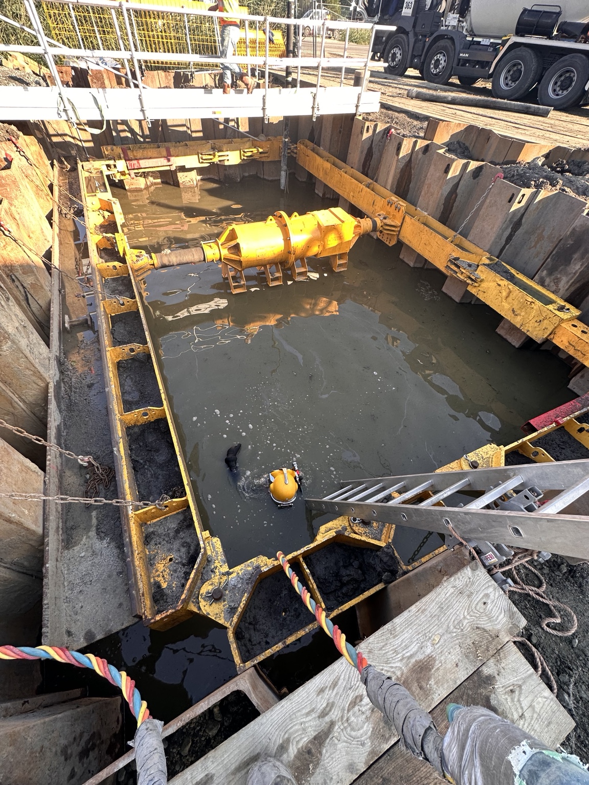 Diver in a flooded construction pit